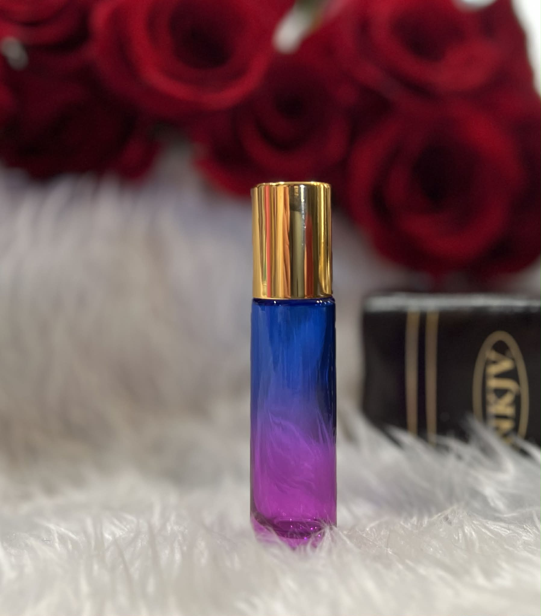 Blue purple and pink ombre glass anointing oil roller bottle