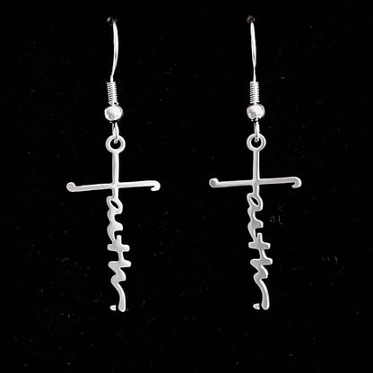 Silver Faith Cross dangle earrings on black background
