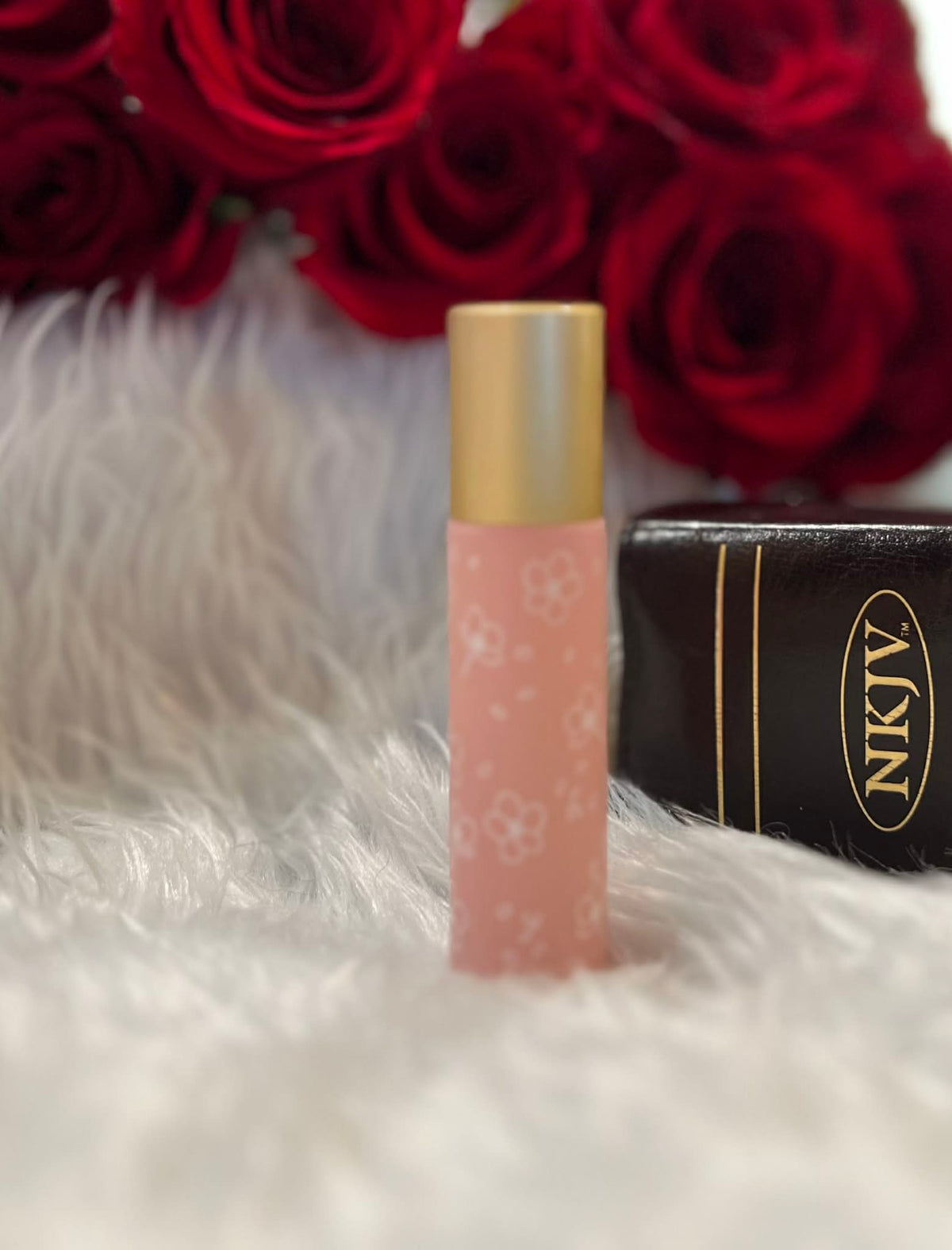 Pastel Pink glass anointing oil roller bottle with white decorative design