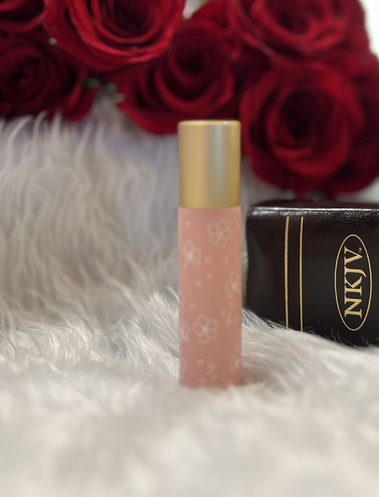 Pastel Pink glass anointing oil roller bottle with white decorative design