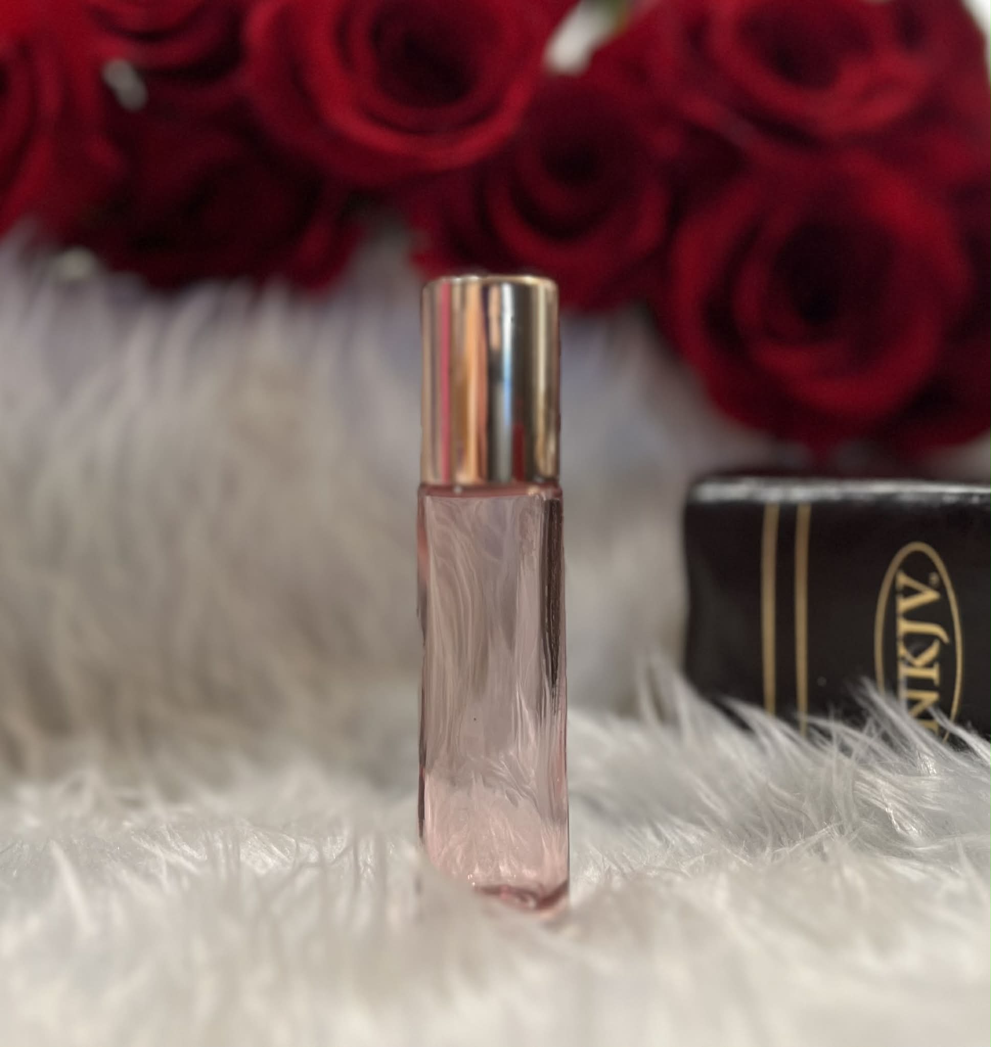 Pink glass anointing oil roller bottle by Decree Candle Co
