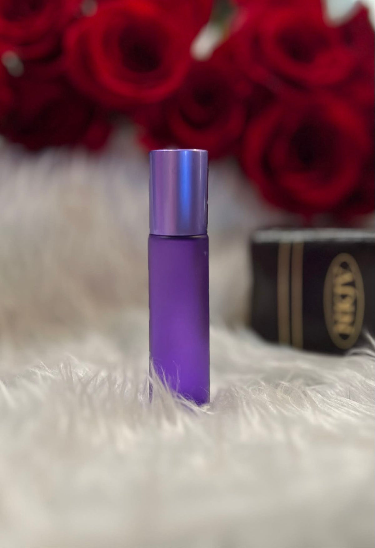 Purple glass anointing oil roller bottle by Decree Candle Co.