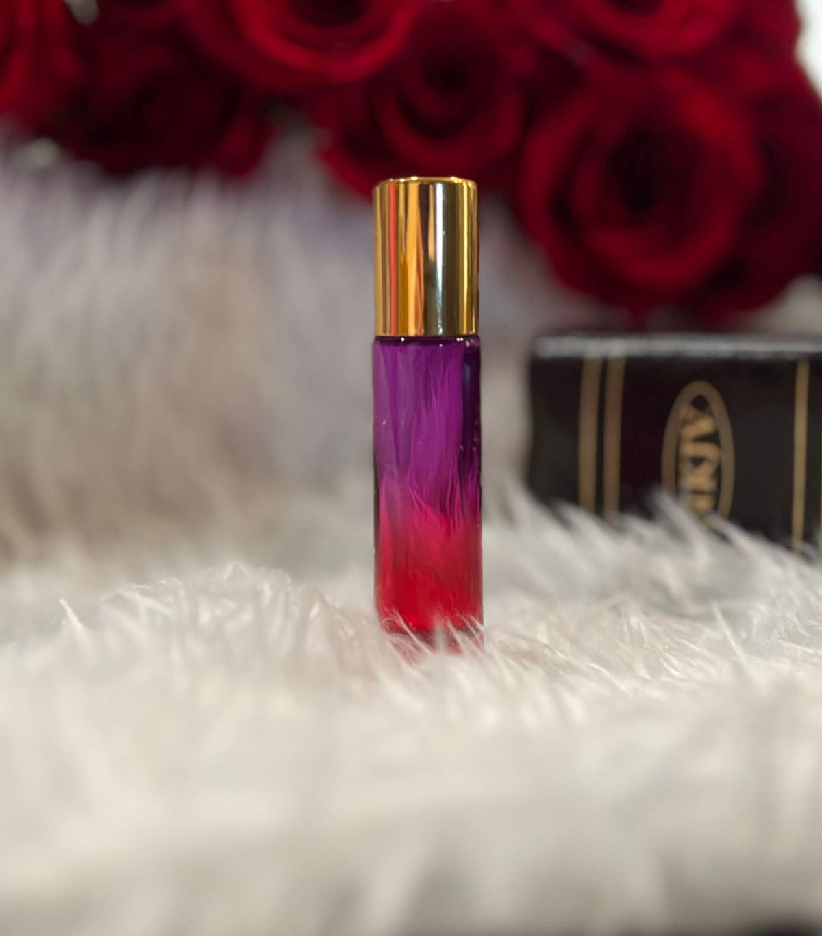 Violet and red ombre glass anointing oil roller bottle